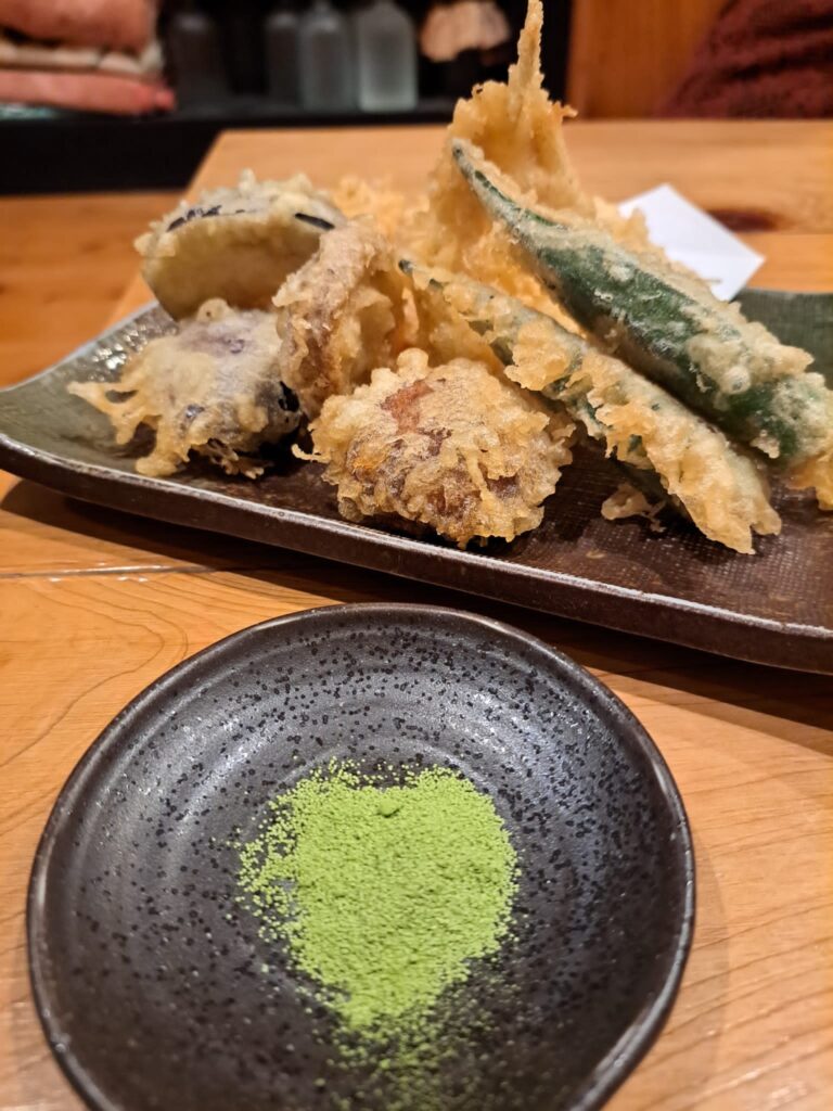 Crispy tempura with green matcha salt