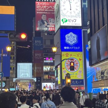 Osaka Dotonbori street view with lots of people in the night time.